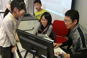 A photograph of children using PLAY Animation